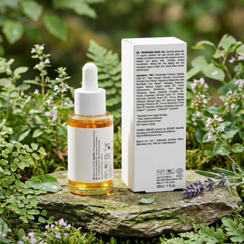 Achterkant van de Adsua Nourishing Facial Oil met de ingrediëntenlijst en het Ecocert COSMOS Organic-keurmerk